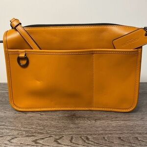Coach Orange Leather Clutch